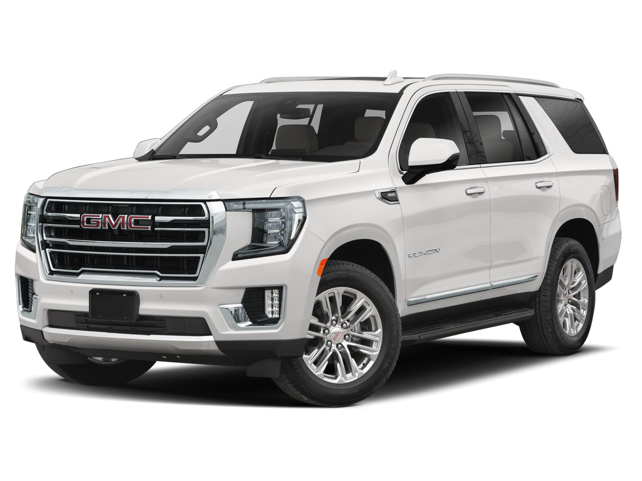 2023 GMC Yukon SLT in Summit White — front three-quarter view